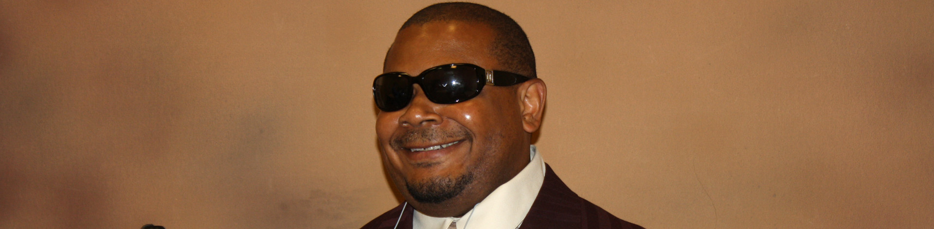 Mike, a member of the NFB on Indiana smiles for the camera.